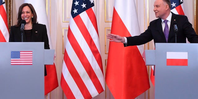 Polish President Andrzej Duda, right, and US Vice President Kamala Harris hold a press conference at Belwelder Palace in Warsaw, Poland, Thursday, March 10, 2022.
