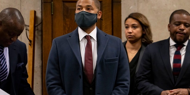 Actor Jussie Smollett appears with his attorneys at his sentencing hearing at the Leighton Criminal Court Building, Thursday, March 10, 2022, in Chicago.