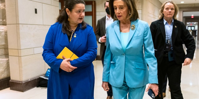 House Speaker Nancy Pelosi walks with Ukraine's ambassador to the United States, Oksana Markarova, after watching the video address by Ukrainian President Volodymyr Zelenskyy to Congress at the Capitol, March 16, 2022.