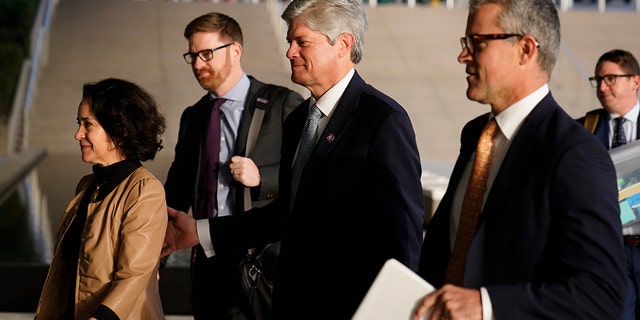 U.S. Rep. Jeff Fortenberry, R-Neb., center, and wife, Celeste, left, arrive at the federal courthouse for his trial in Los Angeles, Wednesday, March 16, 2022.