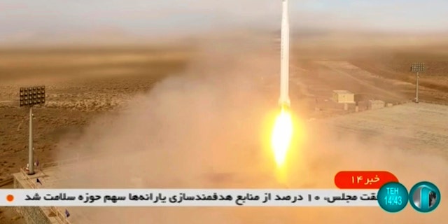 This image taken from video footage aired by Iranian state television on March 8, 2022, shows the launch of a rocket by Iran's Revolutionary Guard carrying a Noor-2 satellite in northeastern Shahroud Desert, Iran. As the war in Ukraine rages on, diplomats trying to salvage the languishing 2015 Iran nuclear deal have been forging ahead with negotiations despite distractions caused by the conflict. 