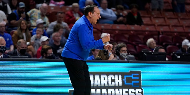 Duke head coach Mike Krzyzewski yells during the first half of a college basketball game against the Cal State Fullerton in the first round of the NCAA tournament on Friday, March 18, 2022, in Greenville, S.C. 