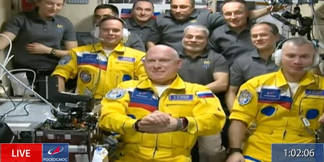 In this frame grab from video provided by Roscosmos, Russian cosmonauts Sergey Korsakov, Oleg Artemyev and Denis Matveyev are seen during a welcome ceremony after arriving at the International Space Station, Friday, March 18, 2022. (Associated Press)