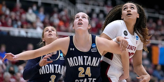 Forward Taylor Janssen, 24, of Montana, rebounds with Stanford Guard Haley Jones in the first half of the first round of the NCAA Women's College Basketball Tournament in Stanford, California on Friday, March 18, 2022. I will fight for it. 