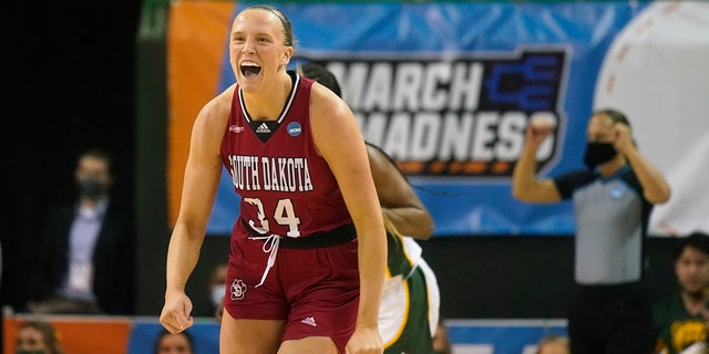 South Dakota center Hannah Sjerven (34) rears to hitting a three-pointer during the first half of a college basketball game against the Baylor in the second round of the NCAA tournament in Waco, Texas, Sunday, March 20, 2022.