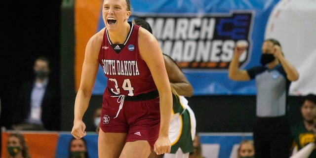 South Dakota center Hannah Sjerven (34) rears to hitting a three-pointer during the first half of a college basketball game against the Baylor in the second round of the NCAA tournament in Waco, Texas, Sunday, March 20, 2022.