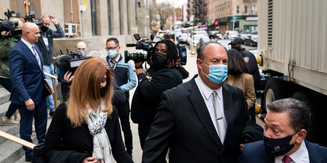 The parents of Lauren Pazienza leave criminal court Tuesday, March 22, 2022. 