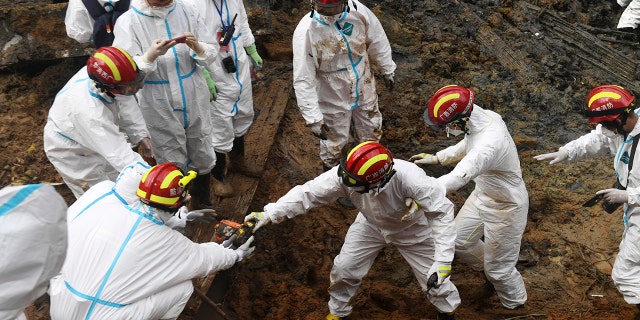 Second 'black box' found in China Eastern plane crash; all on board confirmed dead 4 In this photo released by Xinhua News Agency, rescuers identify objects collected at the core site of Monday's plane crash in Tengxian County, southern China's Guangxi Zhuang Autonomous Region, Friday, March 25, 2022. (Lu Boan/Xinhua via AP)