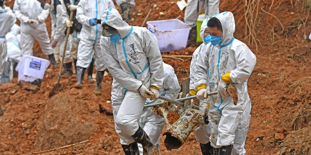 Second 'black box' found in China Eastern plane crash; all on board confirmed dead 3 In this photo released by Xinhua News Agency, rescuers carry a piece of plane wreckage at the site of Monday's plane crash in Tengxian County, southern China's Guangxi Zhuang Autonomous Region, Friday, March 25, 2022. (Zhou Hua/Xinhua via AP)