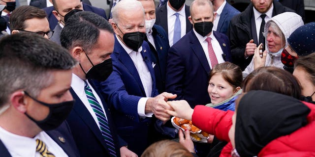 President Biden meets with Ukrainian refugees and humanitarian aid workers during a visit to PGE Narodowy Stadium, Saturday, March 26, 2022, in Warsaw, Poland.