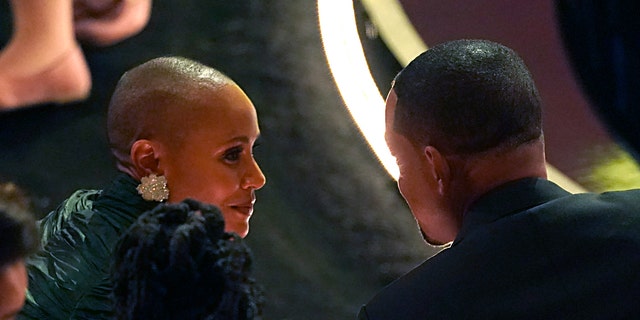 Jada Pinkett Smith, left, and Will Smith appear in the audience at the Oscars on Sunday, March 27, 2022, at the Dolby Theatre in Los Angeles. (AP Photo/Chris Pizzello)