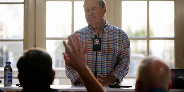 New England Patriots football team head coach Bill Belichick answers questions from journalists at a coaches press availability during the NFL owner's meeting, Monday, March 28, 2022, at The Breakers resort in Palm Beach, Fla.