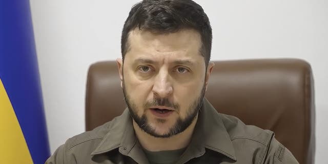 In this image from video provided by the Ukrainian Presidential Press Office, Ukrainian President Volodymyr Zelenskyy speaks to the Norwegian Parliament from Kyiv, Ukraine, Wednesday, March 30, 2022. (Ukrainian Presidential Press Office via AP)