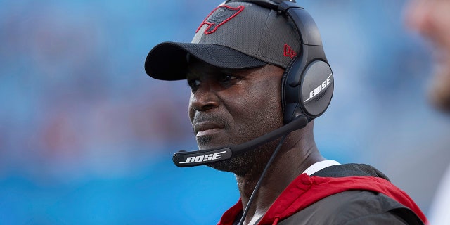 Tampa Bay Buccaneers defensive coordinator Todd Bowles watches from the sideline during a game against the Carolina Panthers Dec. 26, 2021, a Charlotte, N.C.