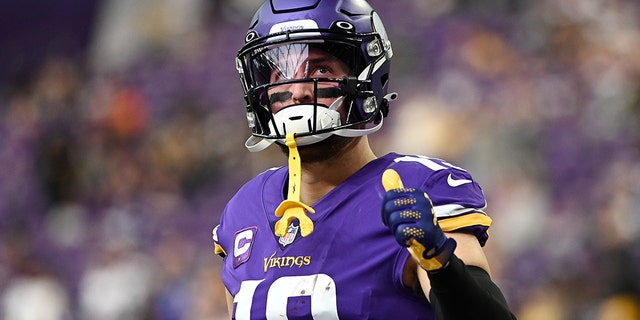 Adam Thielen #19 of the Minnesota Vikings gives a thumbs up while warming up before the game against the Los Angeles Rams at US Bank Stadium on December 26, 2021 in Minneapolis, Minnesota.