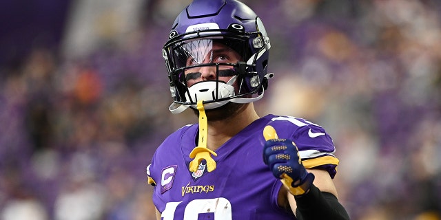 Adam Thielen #19 of the Minnesota Vikings gives a thumbs up as he warms up before the game against the Los Angeles Rams at U.S. Bank Stadium on December 26, 2021 in Minneapolis, Minnesota.