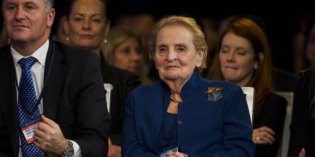 Former U.S. Secretary of State Madeline Albright sits next to New Zealand's Prime Minister John Key as she listens to speakers during the Clinton Global Initiative's annual meeting in New York, on Sept. 29, 2015.