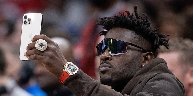 Antonio Brown looks on during the Atlanta Hawks-Los Angeles Clippers game at State Farm Arena on March 11, 2022, ad Atlanta, Georgia.