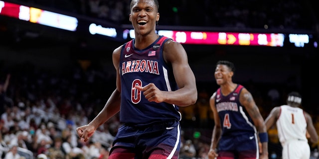 Arizona guard Bennedict Mathurin (0) smiles as his team takes a lead over Southern California during the first half of an NCAA college basketball game Tuesday, March 1, 2022, in Los Angeles.