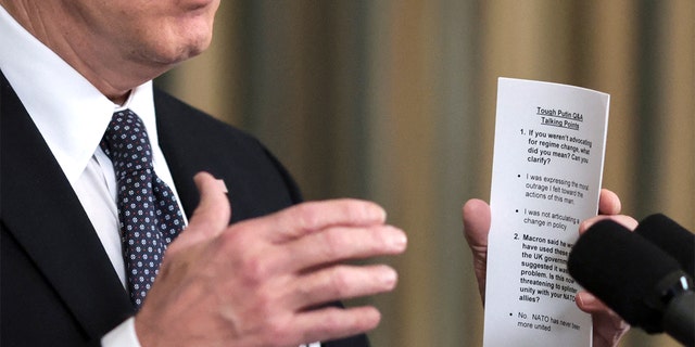 President Biden held a "cheat sheet" of prepared answers during his White House news briefing Monday.
