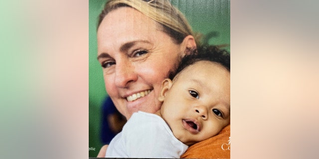 Bilile Jauss comforts a child during her work with Compassion International's Survival Program (CSP) in San Pedro de Macoris, Dominican Republic. Jauss is a former critical care nurse — and says becoming involved in Compassion's program was a "love language for me."