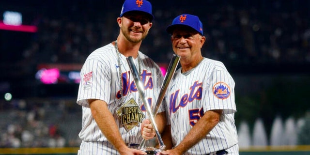 Longtime MLB coach Dave Jauss (right) along with New York Mets slugger Pete Alonso after Alonso won the Home Run Derby in 2021 with a big assist from Jauss — who pitched to him that night. 