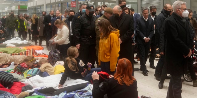 U.S. Secretary of State Antony Blinken, center right, tours a reception center for displaced persons from Ukraine, at the Ukrainian-Polish border crossing in Korczowa, Poland, Saturday, March 5, 2022.