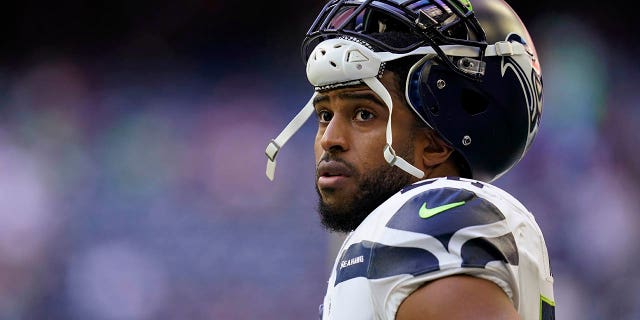 Seattle Seahawks linebacker Bobby Wagner pauses during the team's NFL football game against the Houston Texans on Dec. 12, 2021, in Houston.