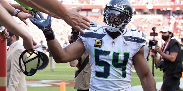 Bobby Wagner #54 of the Seattle Seahawks celebrates with fans after defeating the San Francisco 49ers 28-21 at Levi's Stadium on October 03, 2021, in Santa Clara, California.
