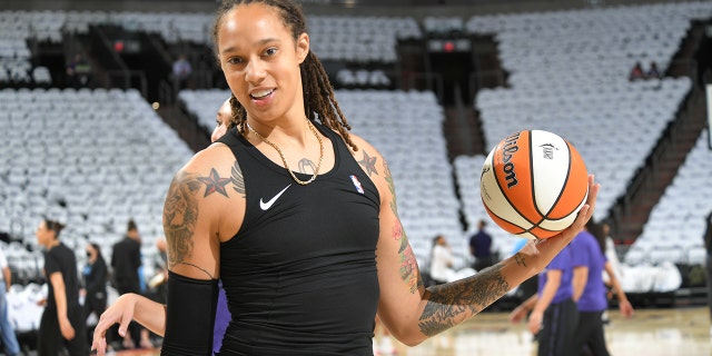 Brittney Griner of the Mercury warms up before the game against the Chicago Sky during the WNBA Finals on Oct. 10, 2021, at Footprint in Phoenix, Arizona.