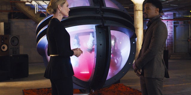 Stephanie March as Akira and Cranston Johnson as Zumbado