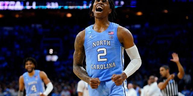 North Carolina's Caleb Love reacts during the second half of a college basketball game against UCLA in the Sweet 16 round of the NCAA tournament, Friday, March 25, 2022, in Philadelphia.