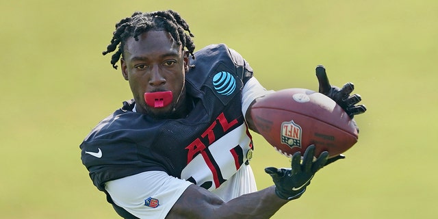 FILE - Atlanta Falcons wide receiver Calvin Ridley (18) makes a catch during the team's NFL training camp football practice Monday, Aug. 9, 2021, in Flowery Branch, Ga. Falcons wide receiver Calvin Ridley has been suspended for the 2022 season for betting on NFL games in the 2021 season.