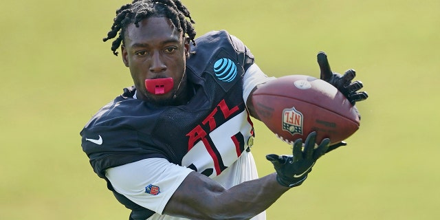 FILE - Atlanta Falcons wide receiver Calvin Ridley (18) makes a catch during the team's NFL training camp football practice Monday, Aug. 9, 2021, in Flowery Branch, Ga. Falcons wide receiver Calvin Ridley has been suspended for the 2022 season for betting on NFL games in the 2021 season.