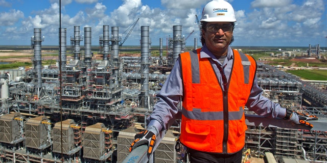 Ari Aziz, director of operations for Cheniere Energy Inc., stands for a photograph at the company's liquefied natural gas (LNG) export terminal under construction in Corpus Christi, Texas, Oct. 3, 2018.