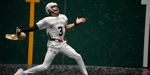 Chris Bueno returns the ball in a Jai ​​Alai match at the Magic City Casino Front in Miami on Sunday, March 13, 2022.