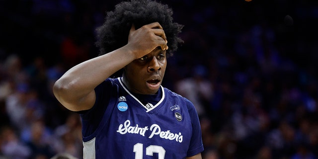 Clarence Rupert #12 of the St. Peter's Peacocks reacts in the second half of the game against the Purdue Boilermakers in the Sweet Sixteen round of the 2022 NCAA Men's Basketball Tournament at Wells Fargo Center on March 25, 2022 in Philadelphia, Pennsylvania.