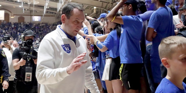 Duke coach Mike Krzyzewski walks off the floor after a tribute in his honor following the NCAA team's game against North Carolina on March 5, 2022 in Durham, North Carolina