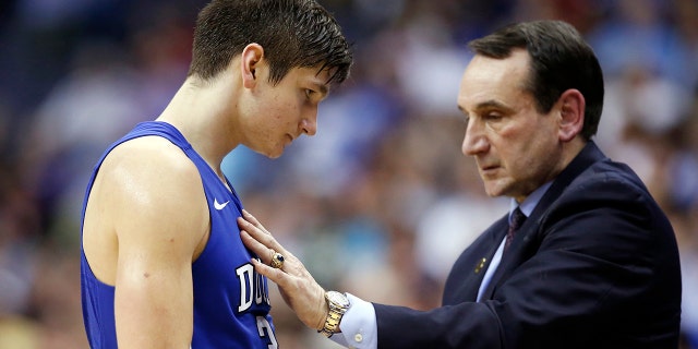 Duke guard Grayson Allen talks with head coach Mike Krzyzewski during the second half of an NCAA college basketball game in the Atlantic Coast Conference Tournament against Notre Dame in Washington, March 10, 2016. Allen is now with the NBA champion Milwaukee Bucks.