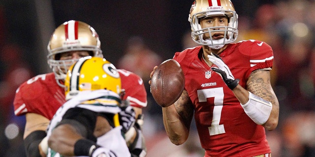 San Francisco 49ers quarterback Colin Kaepernick (7) looks for a receiver during the second quarter of the team's NFC divisional playoff NFL football game against the Green Bay Packers in San Francisco, Jan. 12, 2013. 