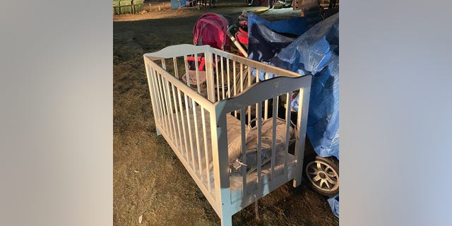 A baby crib is shown near the Poland-Ukraine border.