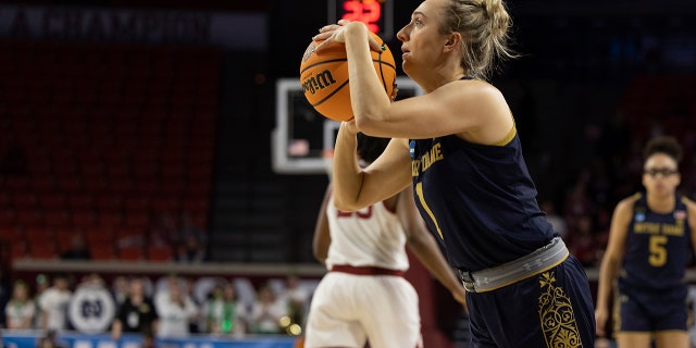 Notre Dame guard Dara Mabrey (1) prepares to shoot a 3-point basket in the first half of a second-round game against Oklahoma in the NCAA women's college basketball tournament Monday, March 21, 2022, in Norman, Okla.
