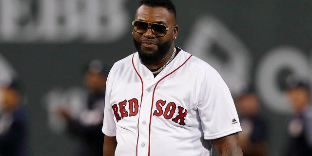 David Ortiz prepares to throw out the ceremonial first pitch before a game between the Red Sox and the New York Yankees in Boston, Sept. 9, 2019.