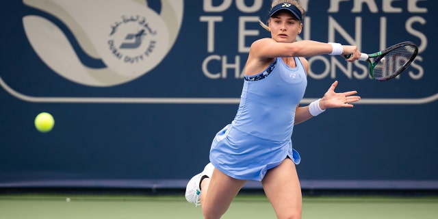 Dayana Yastremska of Ukraine in action against Clara Tauson of Denmark in the second qualification round of Dubai Duty Free Tennis at Dubai Duty Free Tennis Stadium Feb. 13, 2022, in Dubai, United Arab Emirates.
