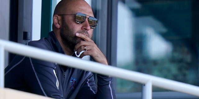 Miami Marlins CEO Derek Jeter watches a spring training game against the Houston Astros on March 5, 2021, in Jupiter, Florida.