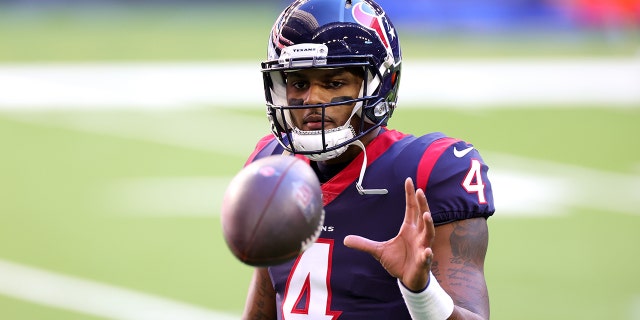 Deshaun Watson # 4 of the Houston Texans in action against the Tennessee Titans during a match at the NRG Stadium on January 3, 2021 in Houston, Texas.