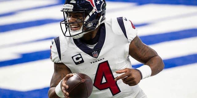 FILE - Houston Texans quarterback Deshaun Watson (4) celebrates a touchdown during the team's NFL football game against the Indianapolis Colts on Dec. 20, 2020, in Indianapolis.