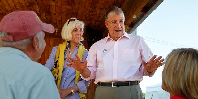 Former independent gubernatorial candidate Eliot Cutler campaigns with his wife, Melanie Cutler on Aug. 13, 2010, in Topsham, Maine. Maine State Police have Cutler on child porn possession charges.   (AP Photo/Robert F. Bukaty, File)