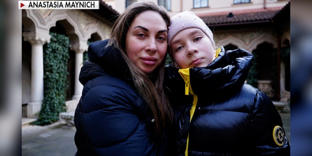 Tetiana and 11-year-old Sofiia are pictured above after crossing into Bucharest. (Anastasia Maynich)