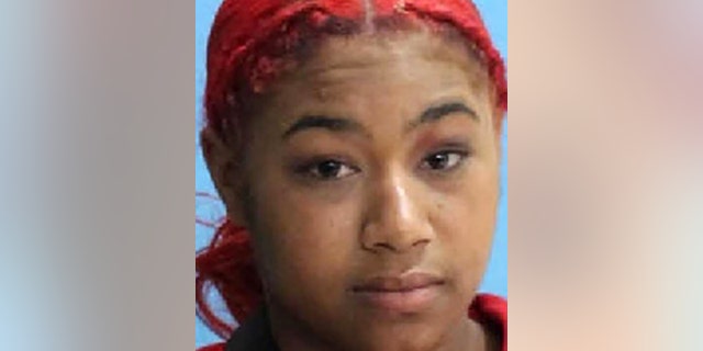 Kiara Morant, 18, was driving an SUV around 4:30 p.m. Wednesday when she crashed into a fenced playground area where the two girls were playing.